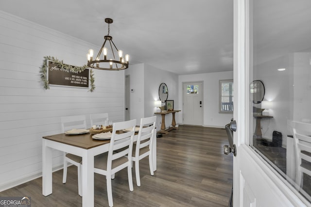 322 Pea Ridge Rd, Franklin, GA 30217 - dining space featuring a chandelier, dark wood finished floors, and wooden walls