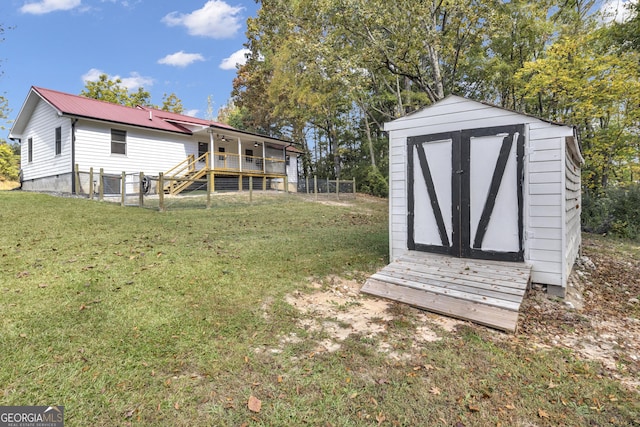 322 Pea Ridge Rd, Franklin, GA 30217 - view of yard with a storage shed, stairs, and a deck