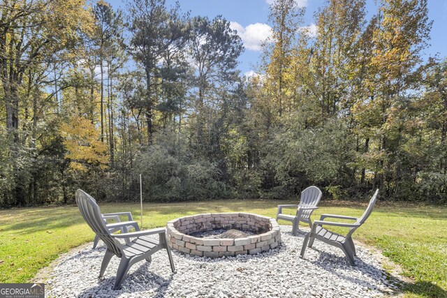 322 Pea Ridge Rd, Franklin, GA 30217 - view of patio / terrace with a fire pit