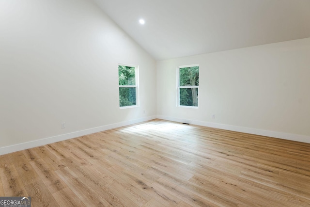 206 2nd St, Gainesville, GA 30504 - empty room featuring lofted ceiling, wood finished floors, and recessed lighting