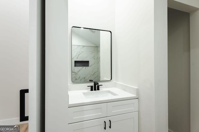 206 2nd St, Gainesville, GA 30504 - full bathroom with vanity and a marble finish shower