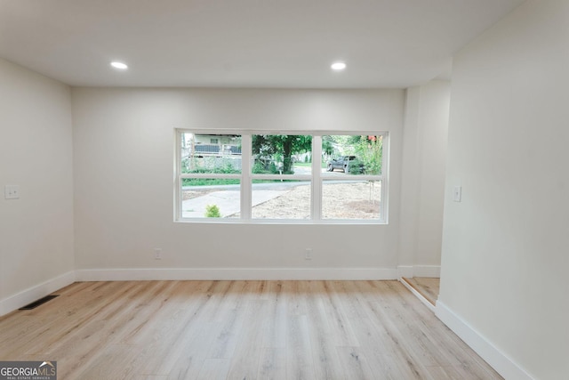 206 2nd St, Gainesville, GA 30504 - empty room featuring wood finished floors and recessed lighting