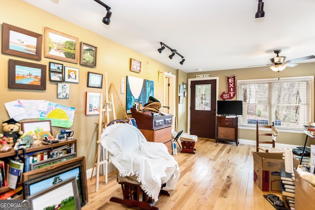 705 Laurel Ridge Dr, Ellijay, GA 30536 - living area featuring track lighting, a ceiling fan, and light wood-style flooring