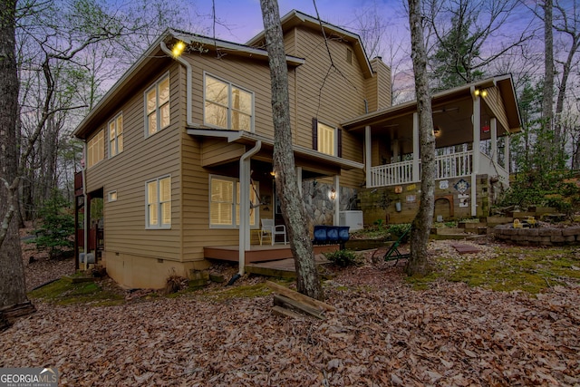 705 Laurel Ridge Dr, Ellijay, GA 30536 - back of house with covered porch, a chimney, and ceiling fan