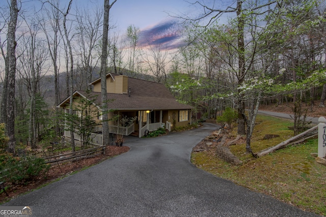 705 Laurel Ridge Dr, Ellijay, GA 30536 - rustic home featuring covered porch, roof with shingles, and driveway