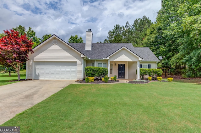 926 Masters Dr, Monroe, GA 30655 - ranch-style house with an attached garage, a chimney, driveway, and a front lawn