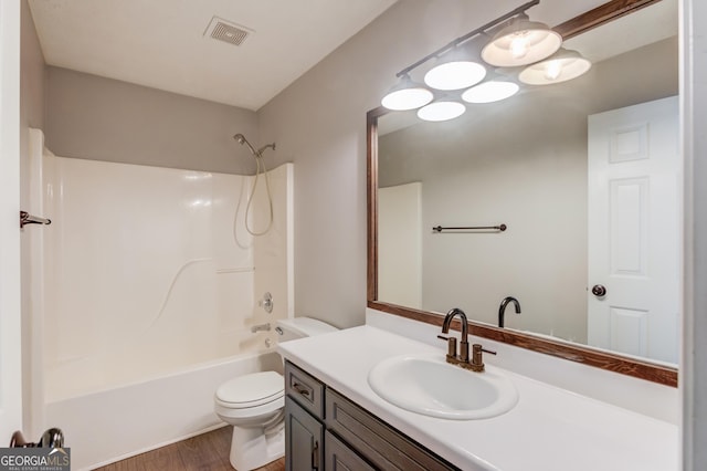 926 Masters Dr, Monroe, GA 30655 - bathroom featuring vanity,  shower combination, and wood finished floors