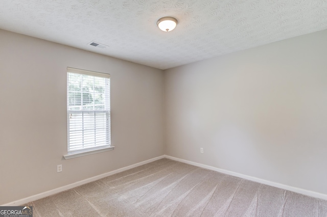 926 Masters Dr, Monroe, GA 30655 - unfurnished room featuring carpet flooring and a textured ceiling