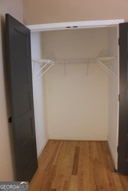 5880 Mulberry St, Austell, GA 30168 - walk in closet with light wood-style flooring