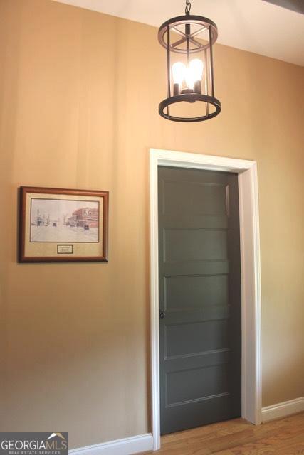 5880 Mulberry St, Austell, GA 30168 - detailed view of baseboards and wood finished floors