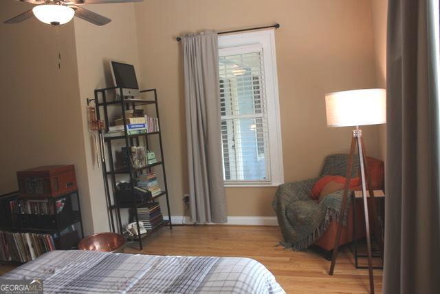 5880 Mulberry St, Austell, GA 30168 - bedroom with wood finished floors and baseboards