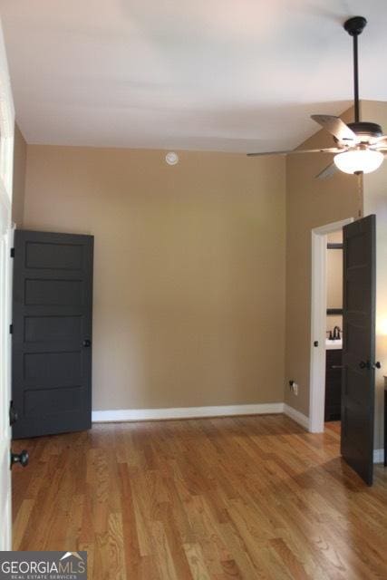 5880 Mulberry St, Austell, GA 30168 - unfurnished room featuring a ceiling fan and light wood-style floors