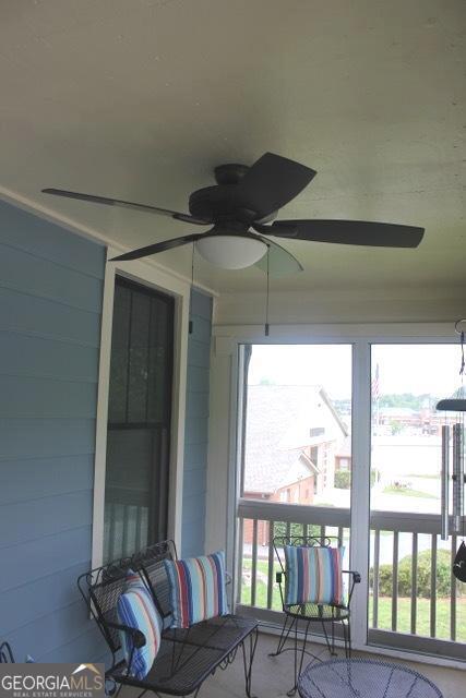 5880 Mulberry St, Austell, GA 30168 - sunroom featuring a ceiling fan