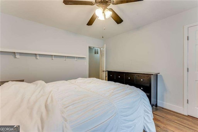 2232 Dunseath Ave NW Unit 309, Atlanta, GA 30318 - bedroom featuring wood finished floors and a ceiling fan