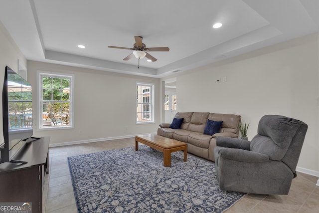 140 Olivia Ct, Fayetteville, GA 30215 - living room featuring a tray ceiling, ceiling fan, light tile patterned flooring, and recessed lighting