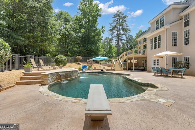 140 Olivia Ct, Fayetteville, GA 30215 - view of pool featuring stairs, a fenced backyard, a patio area, a diving board, and a deck