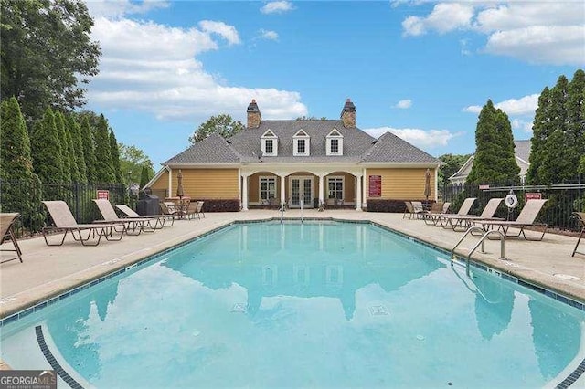 2721 Grapevine Cir Unit 1701, Cumming, GA 30041 - community pool featuring french doors and a patio area