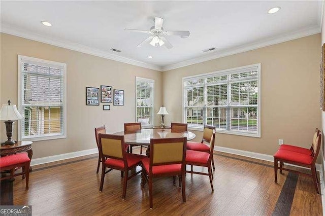 2721 Grapevine Cir Unit 1701, Cumming, GA 30041 - dining area with wood finished floors, a ceiling fan, crown molding, and recessed lighting