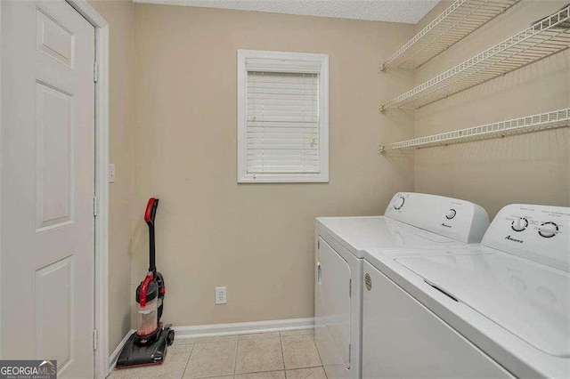 122 S Island Square Dr, Saint Simons, GA 31522 - laundry room with separate washer and dryer and light tile patterned floors
