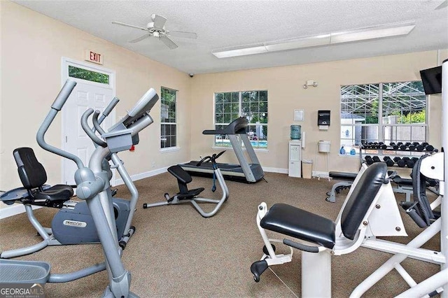 122 S Island Square Dr, Saint Simons, GA 31522 - workout area featuring a textured ceiling and a ceiling fan