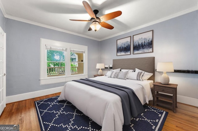 960 Taft Ave NE Unit 9, Atlanta, GA 30309 - bedroom featuring wood finished floors, ornamental molding, and ceiling fan