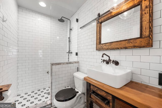 960 Taft Ave NE Unit 9, Atlanta, GA 30309 - full bath with a walk in shower, vanity, tile walls, and backsplash
