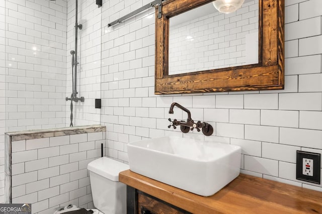 960 Taft Ave NE Unit 9, Atlanta, GA 30309 - bathroom with tile walls and a sink