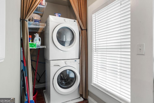 960 Taft Ave NE Unit 9, Atlanta, GA 30309 - laundry room with estacked washer and dryer and baseboards