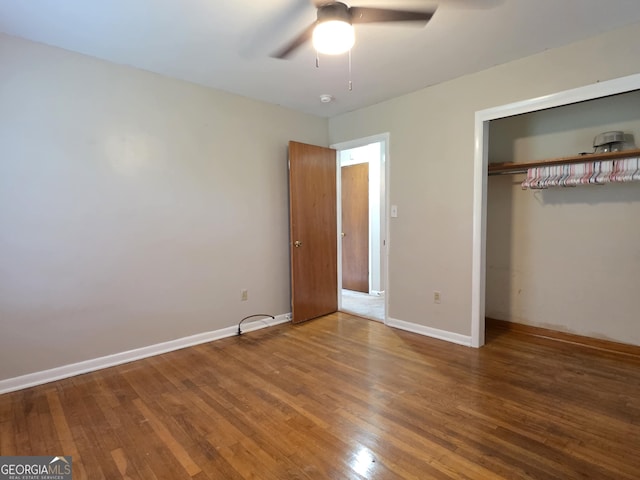 104 Denham St, Thomaston, GA 30286 - unfurnished bedroom with wood finished floors, a closet, and a ceiling fan