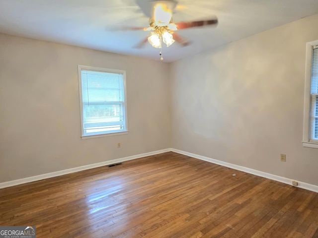 104 Denham St, Thomaston, GA 30286 - empty room with hardwood / wood-style floors and ceiling fan