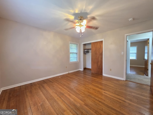 104 Denham St, Thomaston, GA 30286 - unfurnished bedroom featuring hardwood / wood-style floors, a closet, and ceiling fan