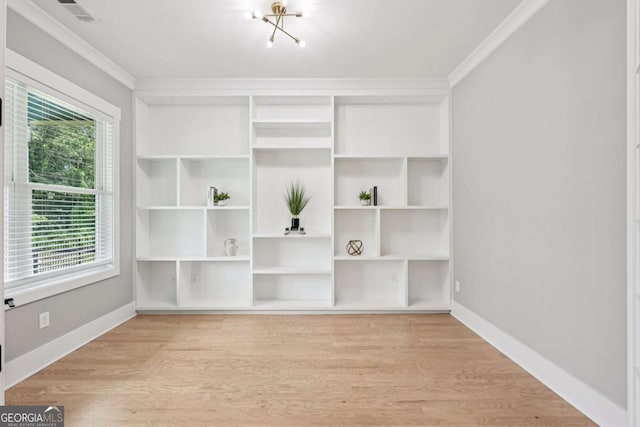 2243 Cain Cir, Dacula, GA 30019 - interior space featuring light wood-style flooring and a chandelier