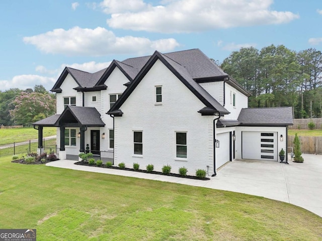 2243 Cain Cir, Dacula, GA 30019 - view of front of property featuring concrete driveway, a garage, and brick siding