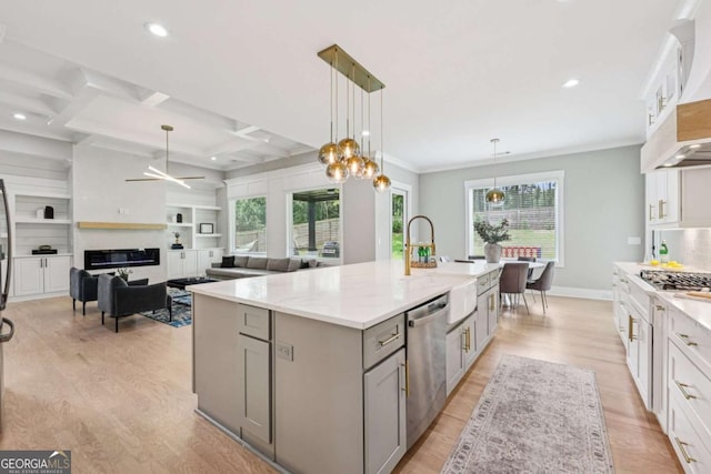 2243 Cain Cir, Dacula, GA 30019 - kitchen featuring gray cabinetry, appliances with stainless steel finishes, light wood finished floors, a large island, and recessed lighting