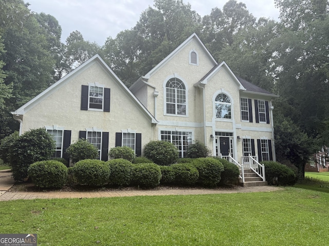 102 Cameron Pointe Dr, Lagrange, GA 30240 - view of front of home with a front lawn and stucco siding
