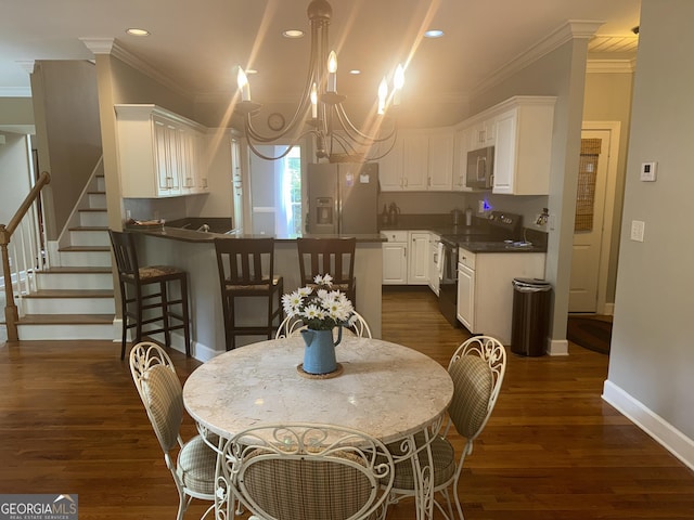 102 Cameron Pointe Dr, Lagrange, GA 30240 - dining room featuring ornamental molding, dark wood-type flooring, recessed lighting, a chandelier, and stairs