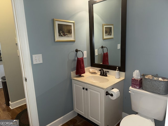102 Cameron Pointe Dr, Lagrange, GA 30240 - half bath featuring vanity and wood finished floors