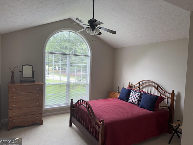 102 Cameron Pointe Dr, Lagrange, GA 30240 - carpeted bedroom with vaulted ceiling, a textured ceiling, and a ceiling fan