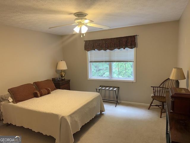 102 Cameron Pointe Dr, Lagrange, GA 30240 - bedroom with light carpet, a textured ceiling, and a ceiling fan