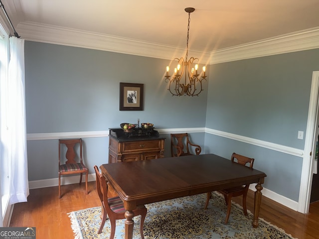102 Cameron Pointe Dr, Lagrange, GA 30240 - dining area with a chandelier, crown molding, and wood finished floors