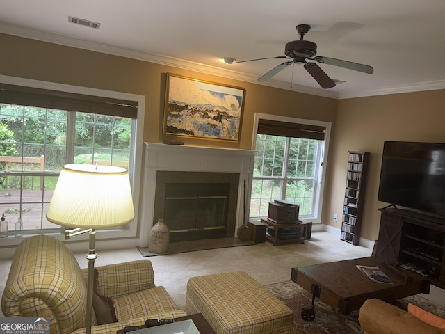 102 Cameron Pointe Dr, Lagrange, GA 30240 - carpeted living room with a fireplace with flush hearth, plenty of natural light, ceiling fan, and ornamental molding
