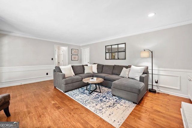 2502 Tritt Springs Trce NE, Marietta, GA 30062 - living area with wood finished floors, crown molding, and a wainscoted wall