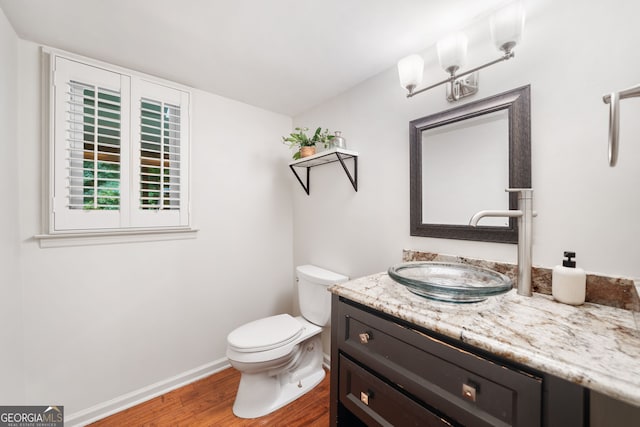 2502 Tritt Springs Trce NE, Marietta, GA 30062 - bathroom with wood finished floors and vanity