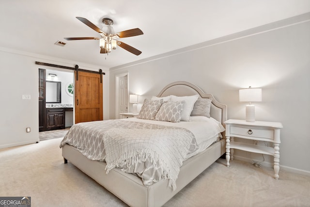 2502 Tritt Springs Trce NE, Marietta, GA 30062 - bedroom with light colored carpet, a barn door, ensuite bathroom, a ceiling fan, and ornamental molding