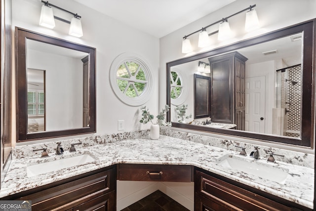 2502 Tritt Springs Trce NE, Marietta, GA 30062 - bathroom with double vanity and a stall shower