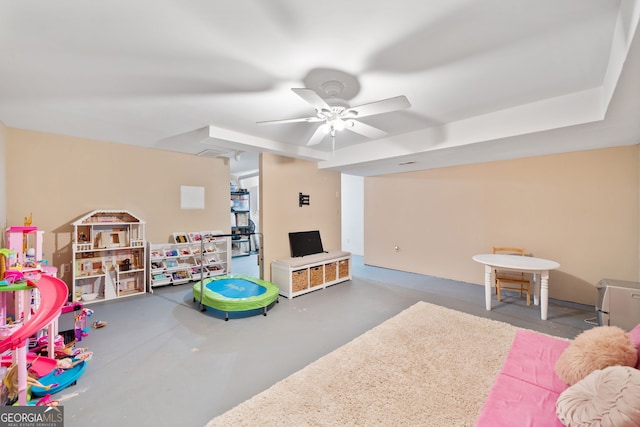 2502 Tritt Springs Trce NE, Marietta, GA 30062 - recreation room with a ceiling fan and concrete flooring