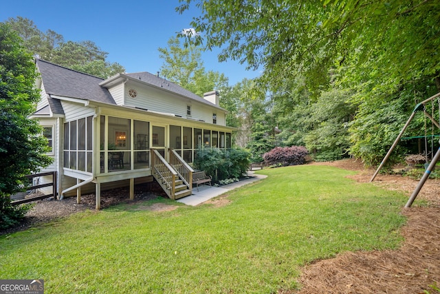 2502 Tritt Springs Trce NE, Marietta, GA 30062 - view of green lawn featuring a sunroom