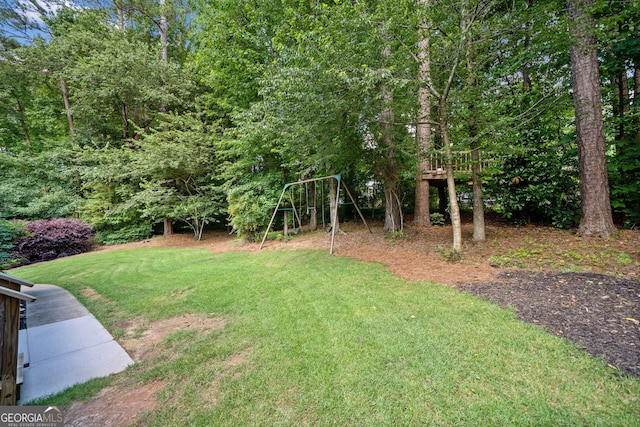 2502 Tritt Springs Trce NE, Marietta, GA 30062 - view of green lawn with a playground