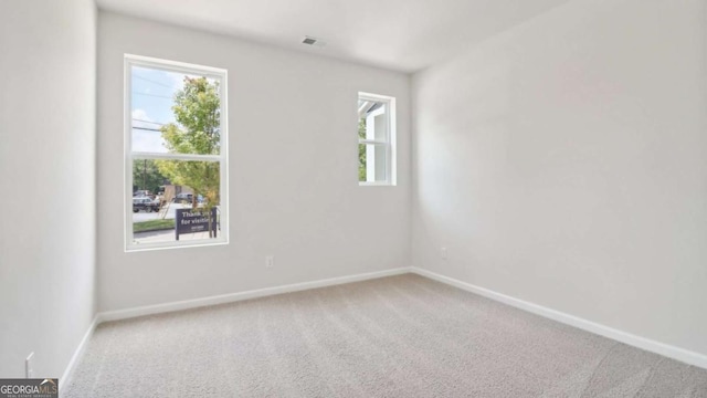 224 College Cir Unit 1013, Hapeville, GA 30354 - carpeted spare room with healthy amount of natural light