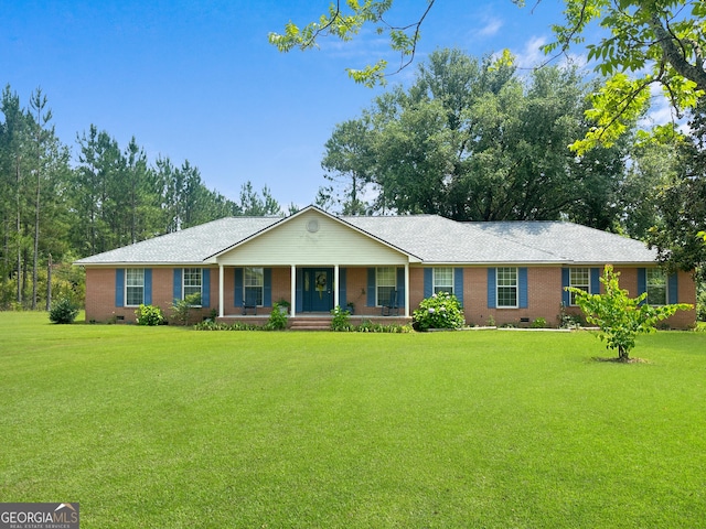 895 Ga Highway 57, Kite, GA 31049 - ranch-style house with a porch, crawl space, brick siding, and a front yard